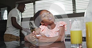 Video of african american father and daughter preparing breakfast