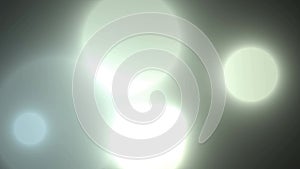 Video boke in the form of light gray rings. Blurred spots of light create a pleasant, light background