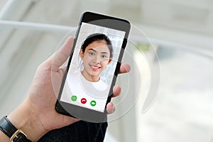 Video call conference, Happy girl having a video chat on mobile phone at home, Asian woman talking video call on a smartphone,