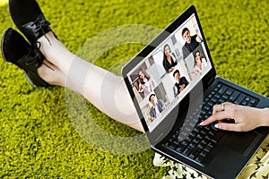 video call distance learning students laptop grass