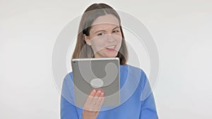 Video Call on Tablet by Young Woman on White Background