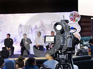 Video camera with blurred people in event