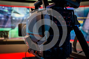 Video camera lens recording show in tv studio focus on camera ap