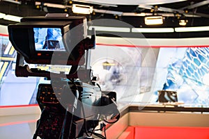 Video camera lens recording show in tv studio focus on camera ap