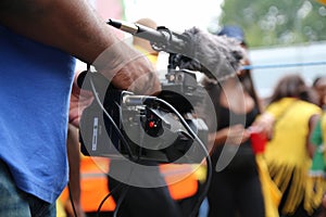 Video camera operator working with his equipment