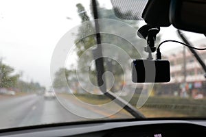 Video camera recorder inside car driving rainy day