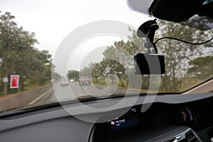 Video camera recorder inside car driving rainy day