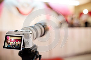 Video camera recording the great moment in wedding ceremony.