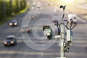 video camera on the road, against the background of cars. commit violations of speed limits, rules of the road