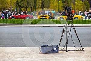 Video camera on tripod without operator. Paris.