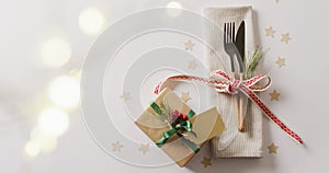 Video of christmas place setting with cutlery and copy space on white background