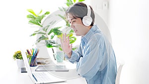 Video conference, Work from home, Asian man making video call to business team with virtual web, Contacting colleague by