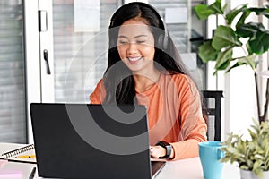 Video conference, Work from home, Asian woman making video call to business team with virtual web, Contacting asia colleagues photo