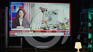 Video on demand cooking channel left open on widescreen television set