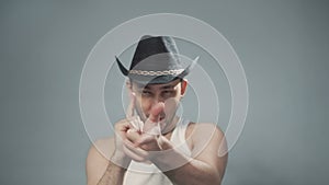 Video of drunk man wearing cowboy`s hat