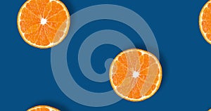 Video of fruit pattern of fresh citrus slices isolated on classic blue background. Flat lay, top view. Pop art video