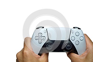 Video game console controller in hand gamer isolated on white background.Playful enjoyment concept.Gamepad for game console