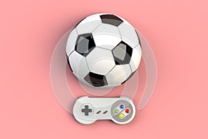 Video game console GamePad. Gaming concept. Top view retro joystick with soccer ball isolated on pink background