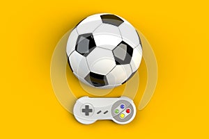 Video game console GamePad. Gaming concept. Top view retro joystick with soccer ball isolated on yellow background