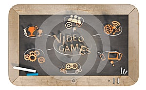 `video games` word with 3D icons on slate chalkboard