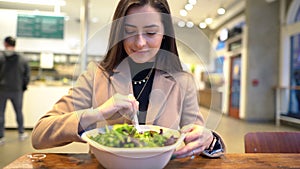 Video of girl eating a salad