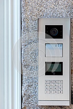 Video intercom with number keyboard in the entry of building