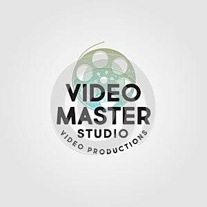 Video Master logo. Video Production Studio emblem. Symbol of cine-film with letters. photo