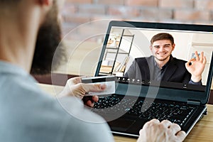 video meeting business man laptop credit card
