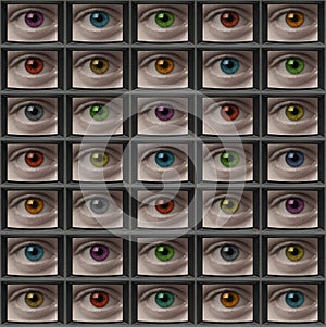 Video monitor screens of eyes with different color pupils
