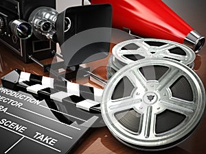 Video, movie, cinema vintage concept. Retro camera, reels and cl