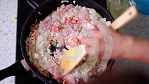 Video recipe for cooking fried rice with bacon and egg. Step 2.