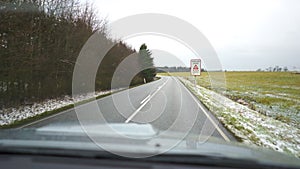 Video of the road while driving. oncoming car. the car moves on an asphalt road