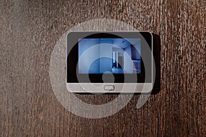 video screen of the peephole or intercom on the front door.