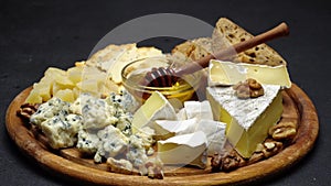 Video of various types of cheese - parmesan, brie, cheddar