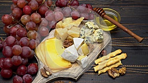 Video of various types of cheese - parmesan, brie, cheddar and roquefort