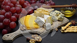 Video of various types of cheese - parmesan, brie, cheddar and roquefort