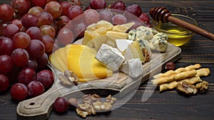 Video of various types of cheese - parmesan, brie, cheddar and roquefort