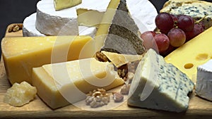 Video of various types of cheese - parmesan, brie, roquefort