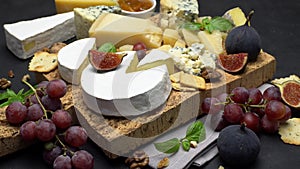 Video of various types of cheese - parmesan, brie, roquefort