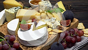 Video of various types of cheese - parmesan, brie, roquefort