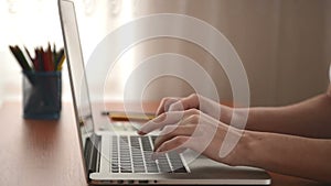 Video Of Woman's Hands typing on laptop keyboard