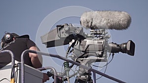 Videographer professional close-up. Static footage. Cameraman shoots a video of a sporting event on a professional