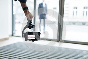 Videographer shooting using new steadycam photo