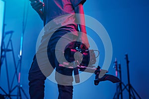 Videomaker using camera for making content