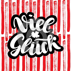 Viel glueck. Good luck in German. Typographic design on colorful cute background. Greeting card with quote. Usable as