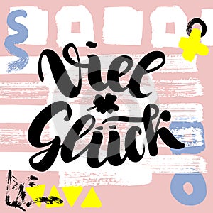 Viel glueck. Good luck in German. Typographic design on colorful cute background. Greeting card with quote. Usable as