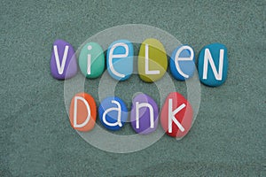 Vielen Dank  german phrase meaning Many Thanks composed with multi colored stone letters