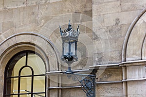 Vienna/Austria - April 2018: Vintage street lantern on a wall on the streets of Vienna