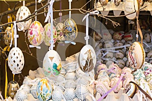 Different colorful painted Easter eggs on the tree at traditional European market