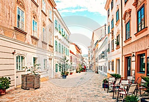 Vienna, Austria. Charming cobblestone street in Spitteleberg with street cafe.